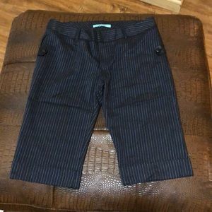 Pin-Striped dress pant with leather pocket detail